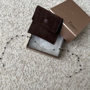 Tapper’s sideway cross necklace in sterling silver, black beads, & diamond cross